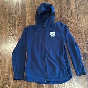 Men’s Nike Dri-fit Butler Medium jacket with pockets and hood.